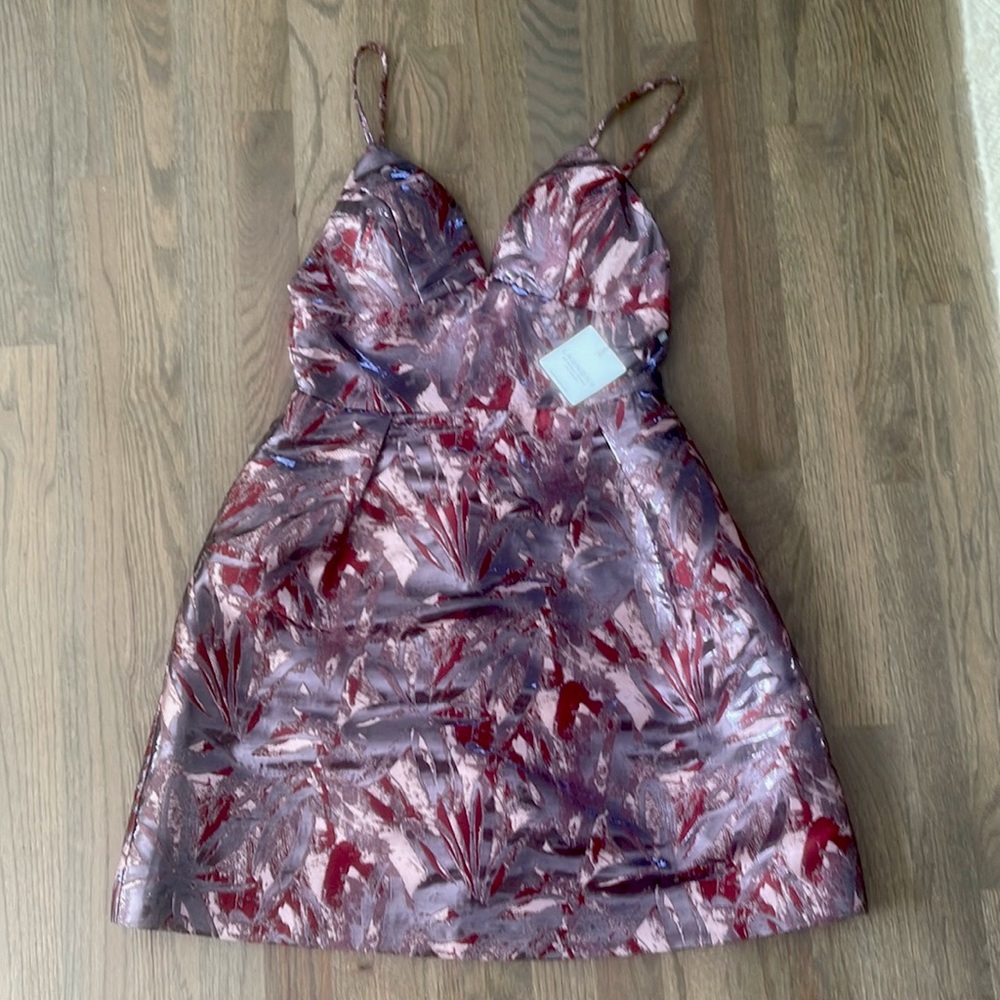 Beautiful going out party dress. Fits so comfortable. Material is light weight.